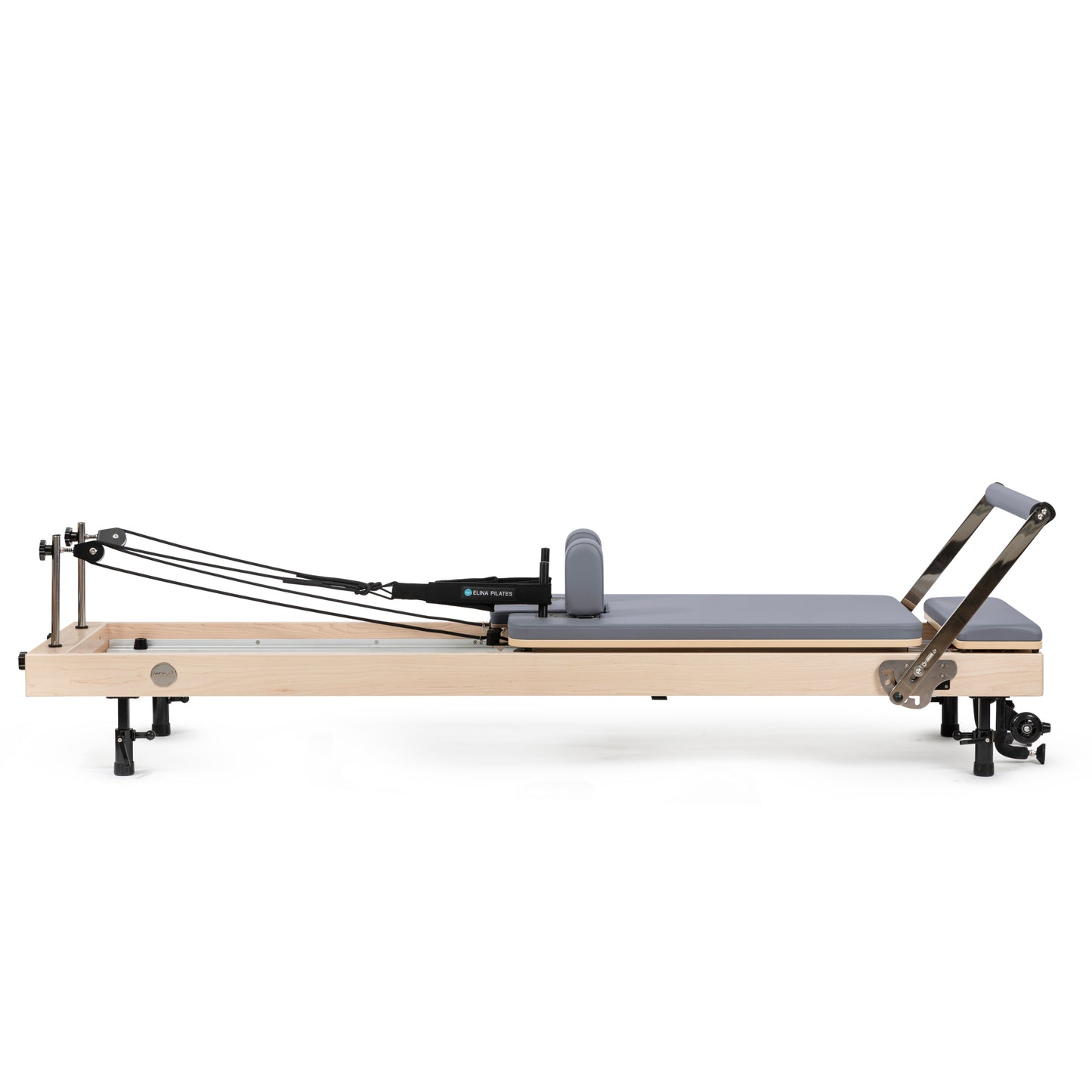 Vertical Pilates reformer in home studio setting