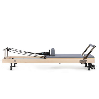 Vertical Pilates reformer in home studio setting