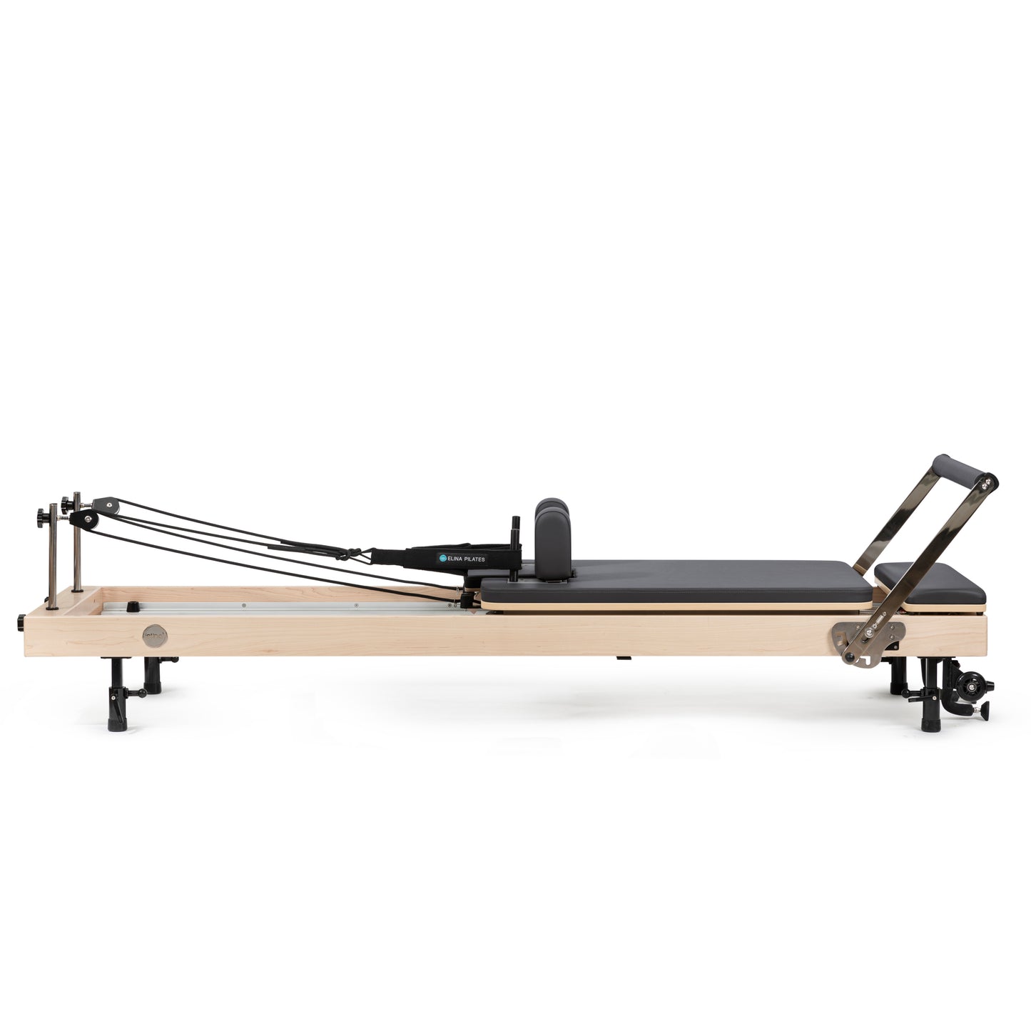 Vertical Pilates reformer in home studio setting