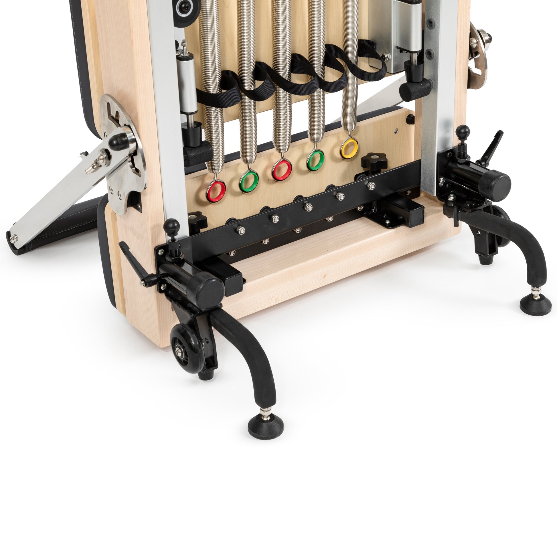 Vertical Pilates reformer in home studio setting