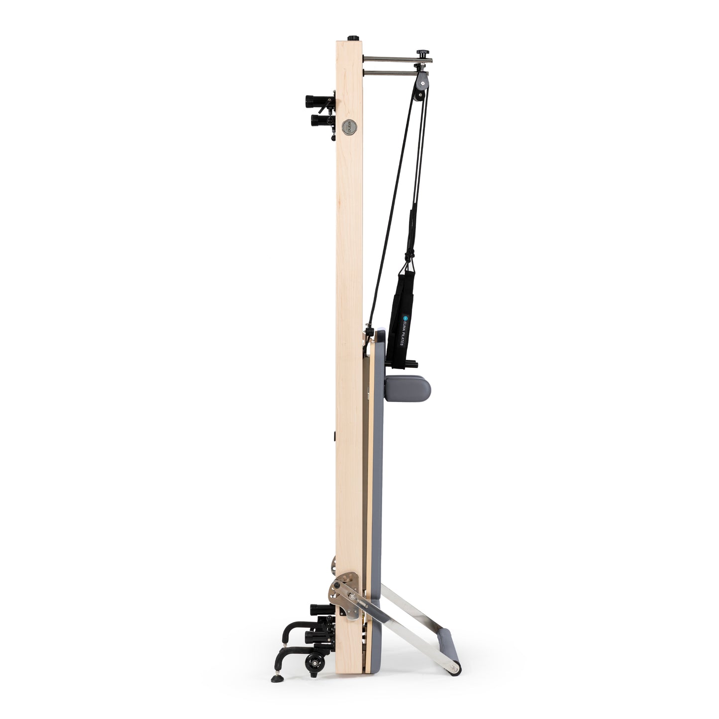 Vertical Pilates reformer in home studio setting