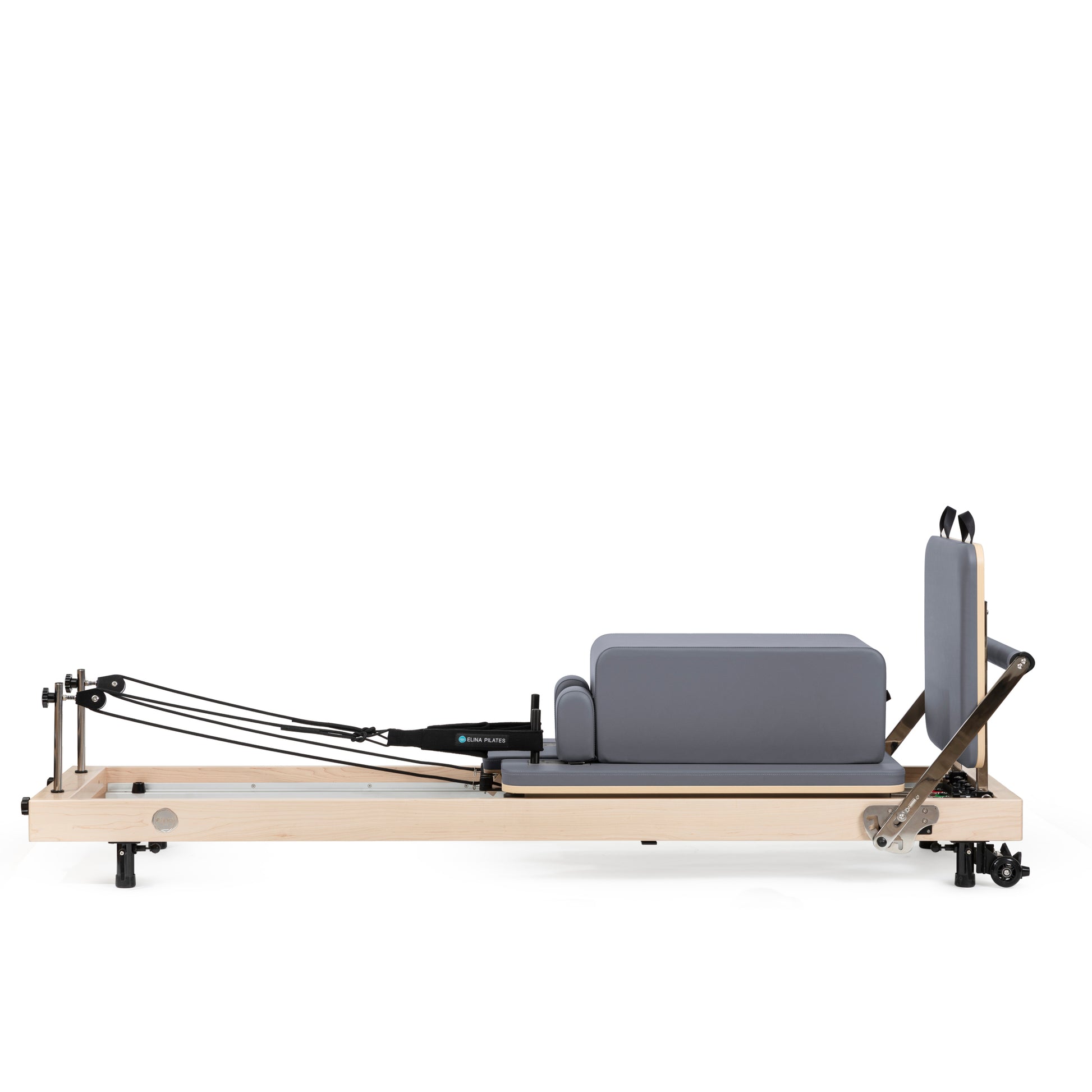 Vertical Pilates reformer in home studio setting