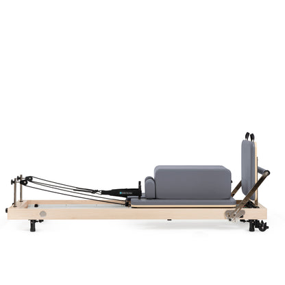 Vertical Pilates reformer in home studio setting
