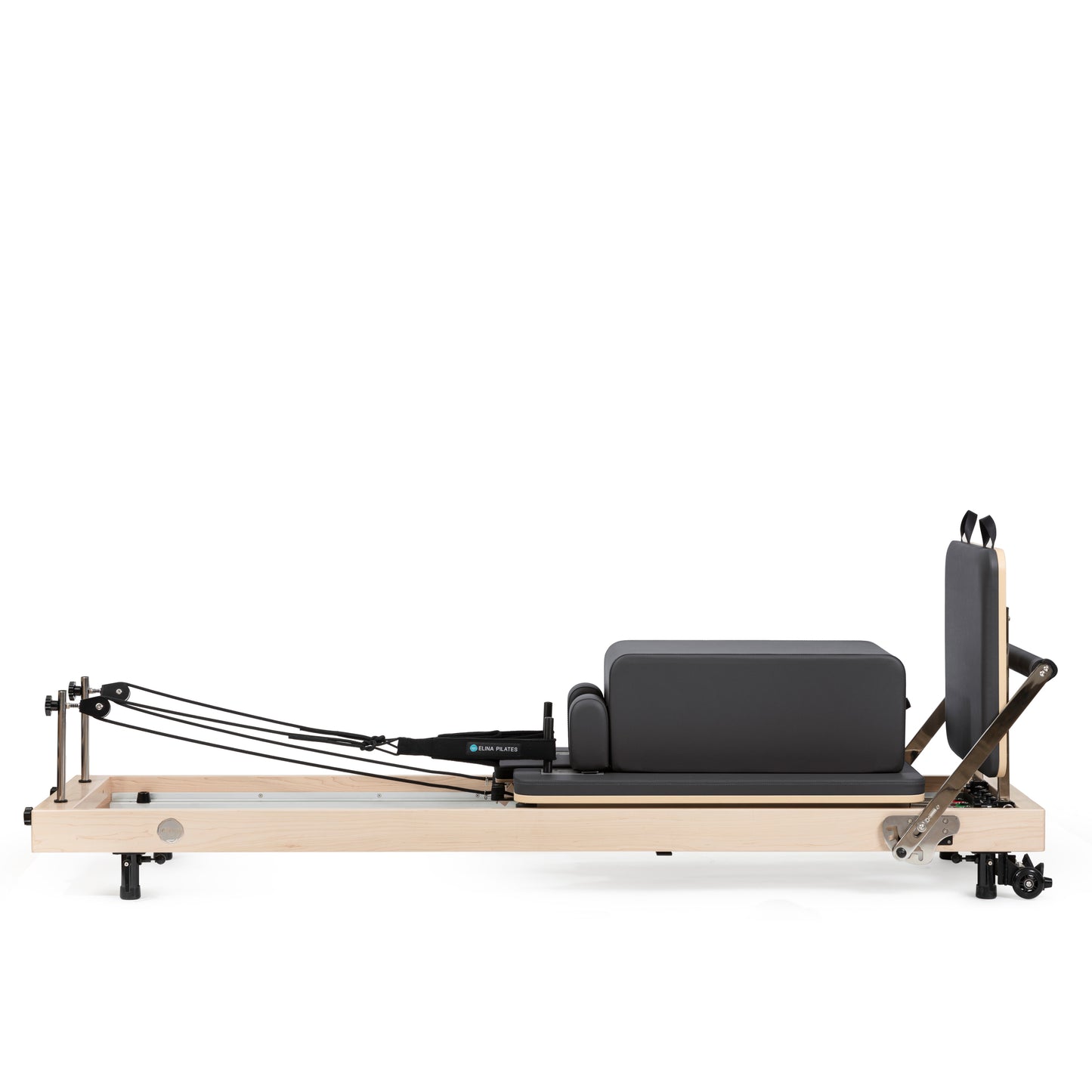Vertical Pilates reformer in home studio setting