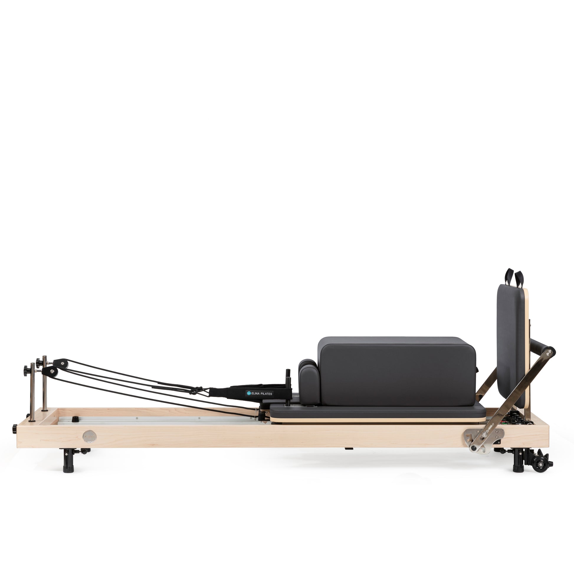 Vertical Pilates reformer in home studio setting