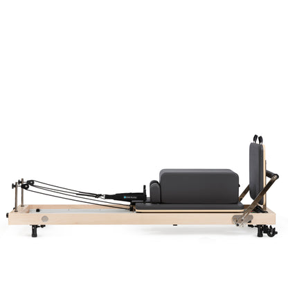 Vertical Pilates reformer in home studio setting