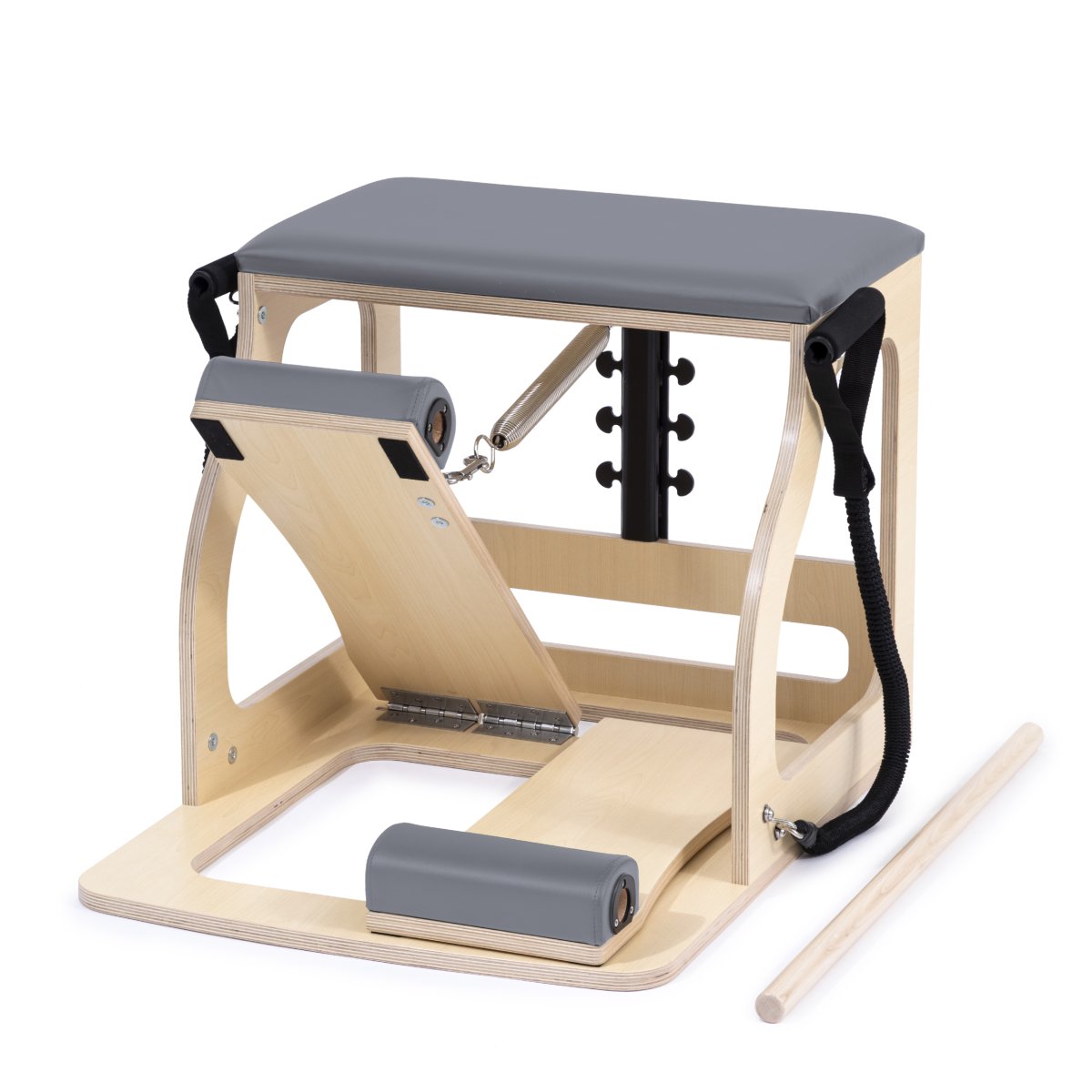 Pilates reformer machine with wooden frame and gray cushion on a white background